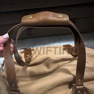 SOLD - RARE FOLKLORE TAYLOR SWIFT leaving out the side door duffle bag